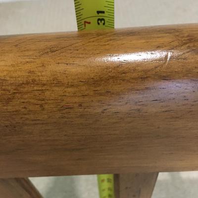 Carved wood bench with upholstered seat