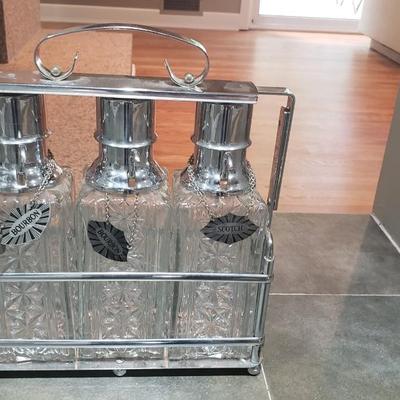 3 Decanters Tantalus caddy with glass bottles