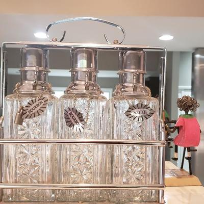 3 Decanters Tantalus caddy with glass bottles