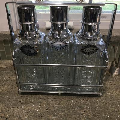3 Decanters Tantalus caddy with glass bottles