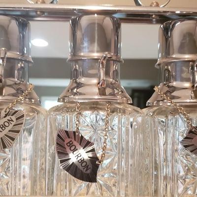 3 Decanters Tantalus caddy with glass bottles