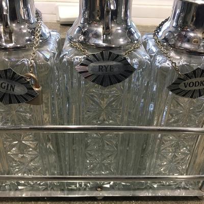 3 Decanters Tantalus caddy with glass bottles