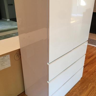 Vintage High gloss Armoire with drawers.