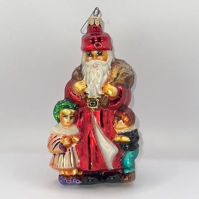 1310 Christopher Radko Gather Round Glass Ornament