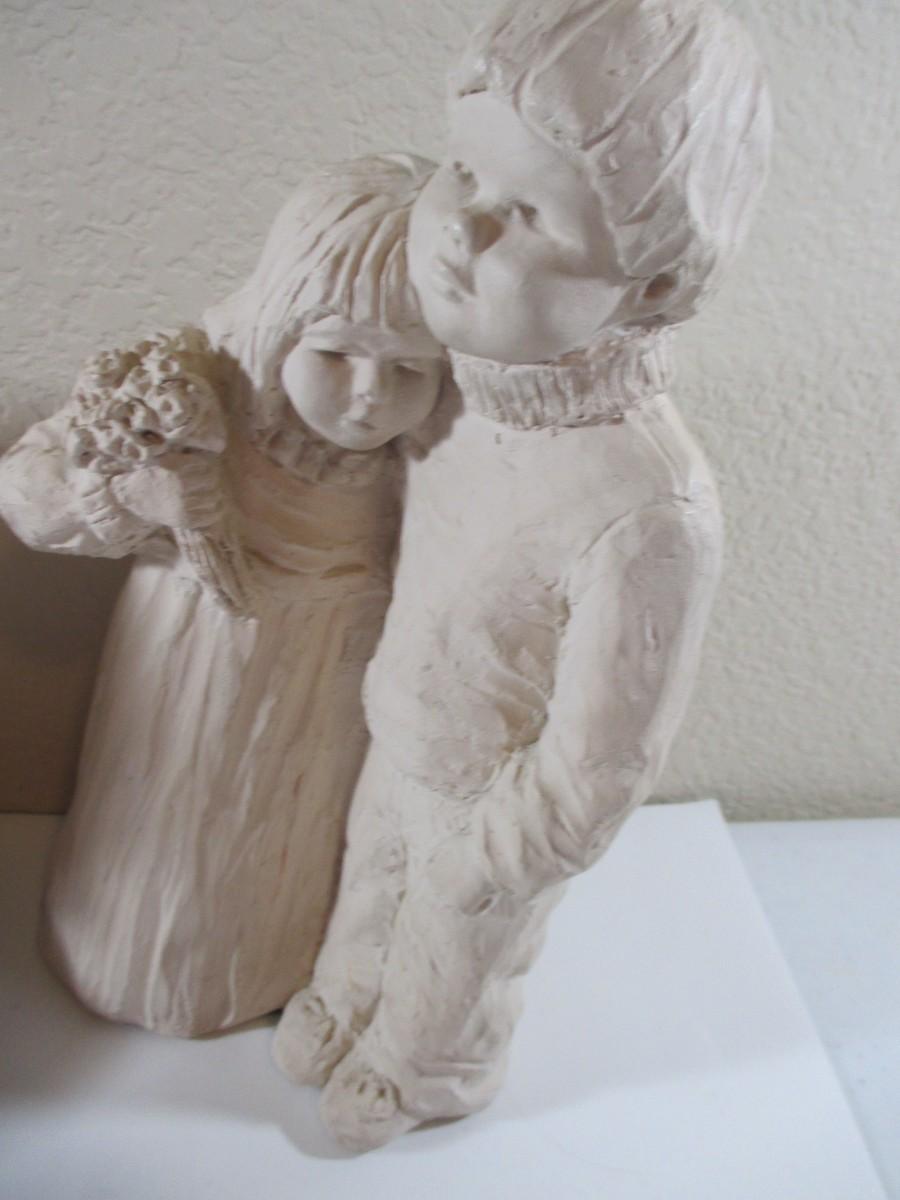 Austin Production company Girl and boy approx 810" tall