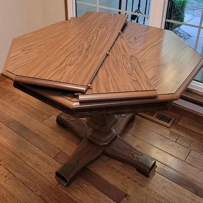 Nice Octagonal Dining Table with Two Rolling Chairs