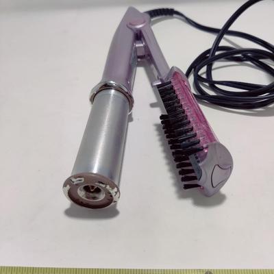 THE ROTATING IRON INSTYLER