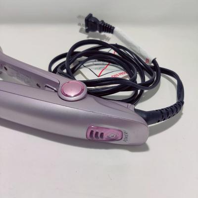 THE ROTATING IRON INSTYLER