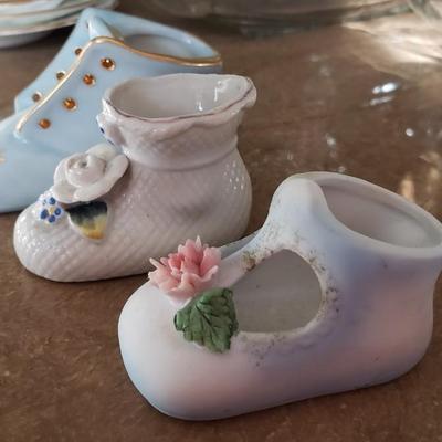 3 porcelain miniature baby shoes