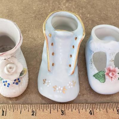 3 porcelain miniature baby shoes