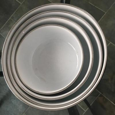 Set of enamel mixing bowls.