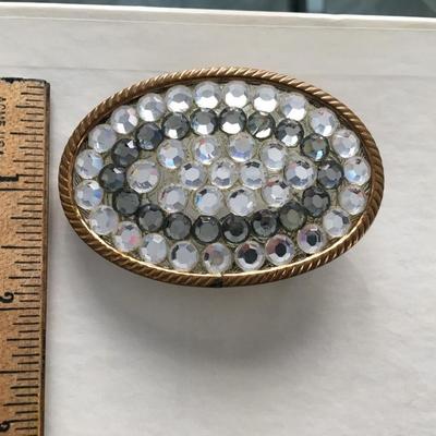 Rhinestone belt buckle.