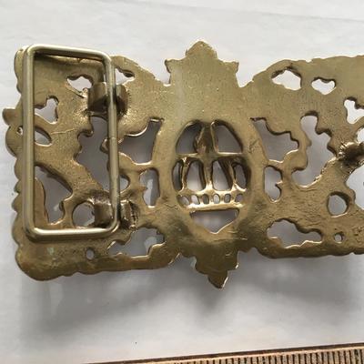 Royal style belt buckle.