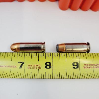 SUPER X .38 AUTOMATIC AMMO W/ PLASTIC STORAGE CONTAINERS