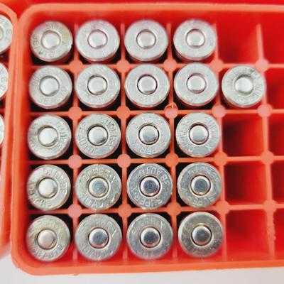 SUPER X .38 AUTOMATIC AMMO W/ PLASTIC STORAGE CONTAINERS