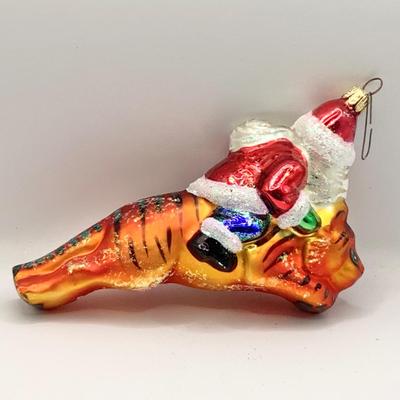 Lot 1336 Christopher Radko Glass Ornament, Santa Riding Tiger, with box