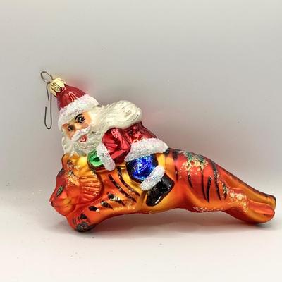 Lot 1336 Christopher Radko Glass Ornament, Santa Riding Tiger, with box