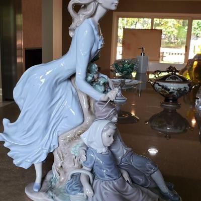 Lladro fairy godmother with two children