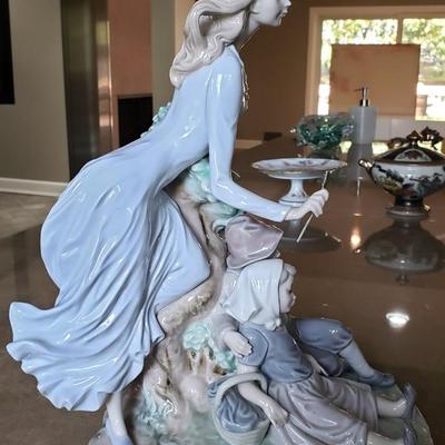 Lladro fairy godmother with two children