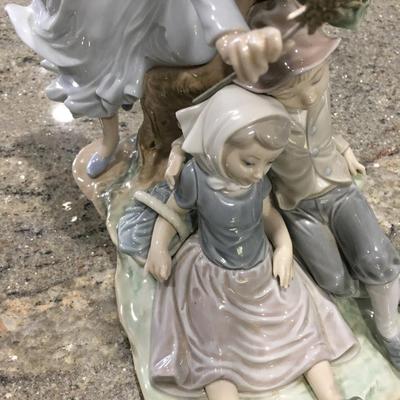 Lladro fairy godmother with two children