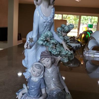 Lladro fairy godmother with two children
