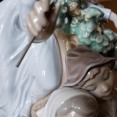 Lladro fairy godmother with two children