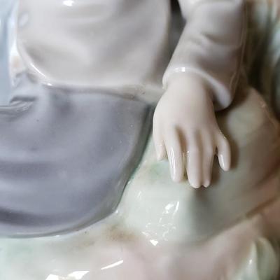 Lladro fairy godmother with two children