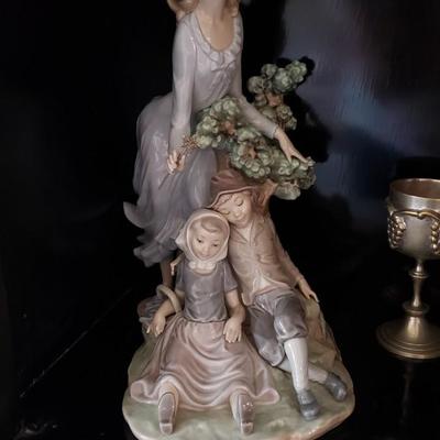 Lladro fairy godmother with two children