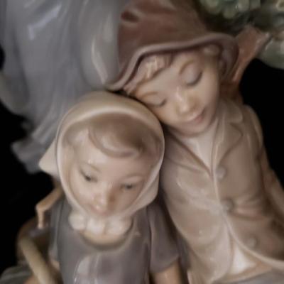 Lladro fairy godmother with two children