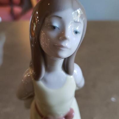 Lladro "Naughty Girl with straw Hat" #05006