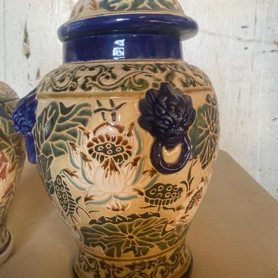 Two oriental pots with removable lids