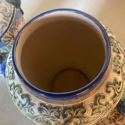 Two oriental pots with removable lids