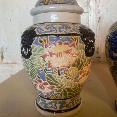 Two oriental pots with removable lids