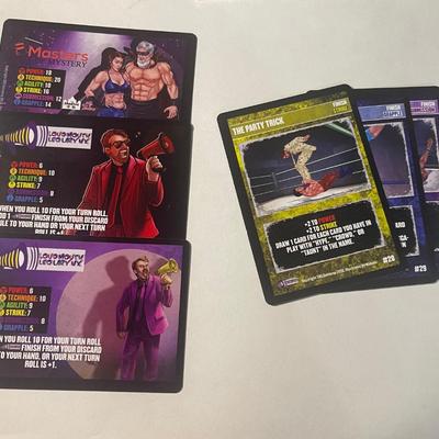 Masters of Mystery tag, Loudmouth Leo Larynx red and purple with 1 set of finishers