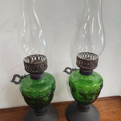 Two Green Glass Oil Lamps