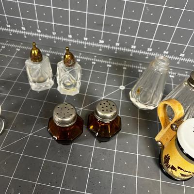 Collection of Glass Salt and Pepper Shakers 