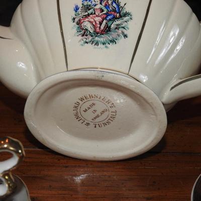 Collection of teacups and a teapot