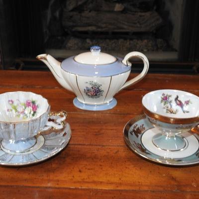 Collection of teacups and a teapot