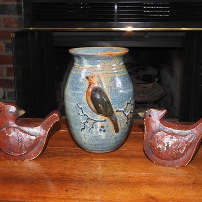 Pottery vase and wood carved Cardinals