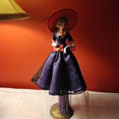 Red Hat Popular Creations Tassel Doll With Stand