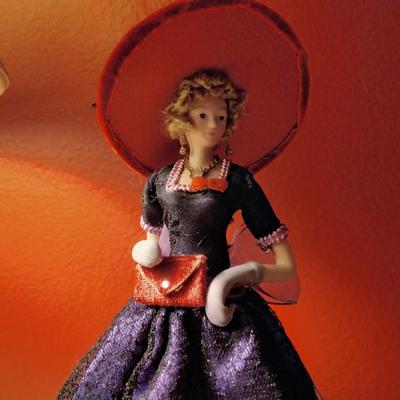 Red Hat Popular Creations Tassel Doll With Stand