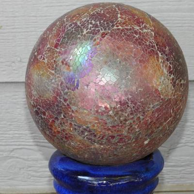 Beautiful glass gazing ball with terracotta pedestal