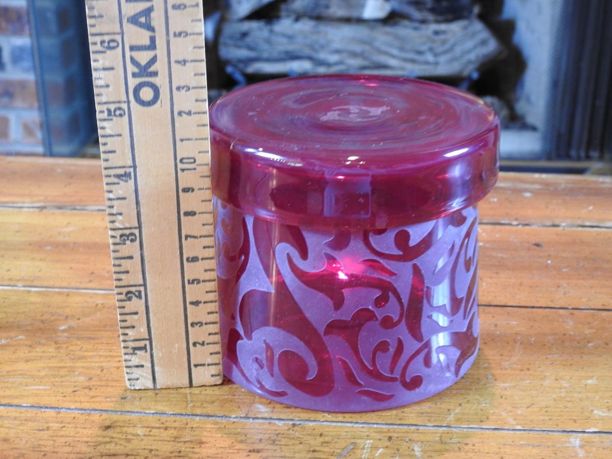 Beautiful cranberry glass lidded jar