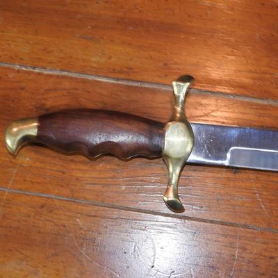 Sword in leather scabbard