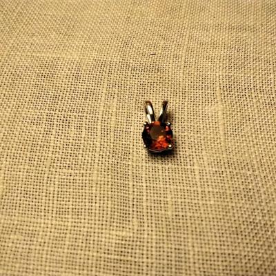 . 85 ctw Garnet Round Cut 6 mm 925 SS Pendant
