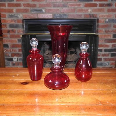 Vintage ruby red perfume bottles
