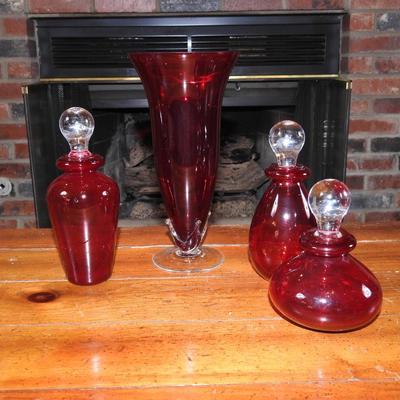 Vintage ruby red perfume bottles