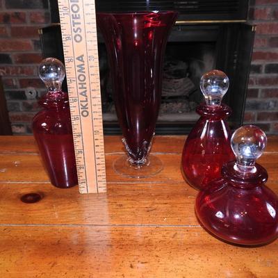 Vintage ruby red perfume bottles