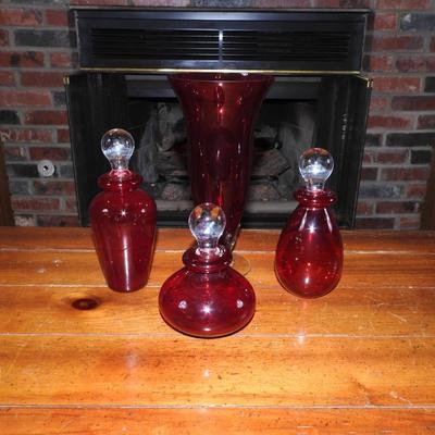 Vintage ruby red perfume bottles