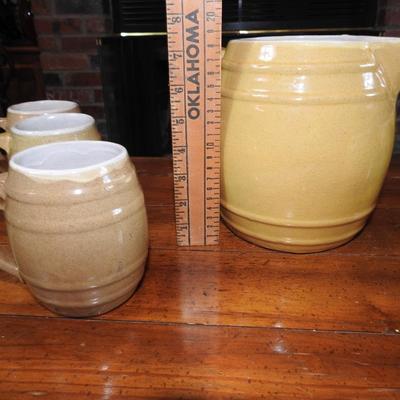 Beautiful pottery pitcher and mugs set